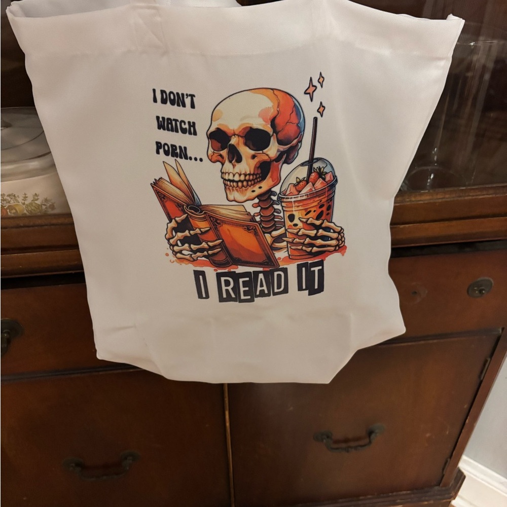 White Tote Bag with Skull and Book Design